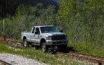 Narrow gage Hi-Rail truck at Glacier Station